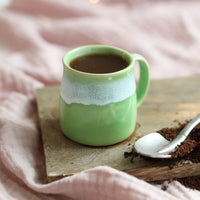 A green espresso cup from Glosters. 